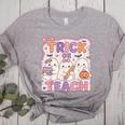 Trick Or Teach Retro Halloween Teacher Look Women's Heather T-Shirt Athletic Heather Trick Or Teach Retro Halloween Teacher Look Women's Heather T-Shirt Athletic Heather