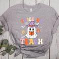 Trick Or Teach Teacher Groovy Ghost Halloween Teacher Women's Heather T-Shirt Athletic Heather Trick Or Teach Teacher Groovy Ghost Halloween Teacher Women's Heather T-Shirt Athletic Heather