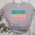 Never Underestimate A Public School Teacher Groovy Women Women's Heather T-Shirt Athletic Heather