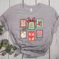 Vintage Preppy Very Merry Teacher Santa Stamps Christmas Women's Heather T-Shirt Athletic Heather Vintage Preppy Very Merry Teacher Santa Stamps Christmas Women's Heather T-Shirt Athletic Heather