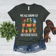 We All Grow At Different Rates Back To School Teacher Women's Heather T-Shirt Heather Forest We All Grow At Different Rates Back To School Teacher Women's Heather T-Shirt Heather Forest