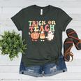 Trick Or Teach Pumpkin Candy Corn Ghost Halloween Teacher Women's Heather T-Shirt Heather Forest