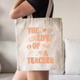 The Life Of A Teacher Back To School Women Men Canvas Tote Bag, novelty gifts, funny gifts