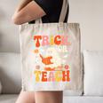 Trick Or Teach Halloween Shirt For Teacher Kids Floral Ghost Canvas Tote Bag, novelty gifts, funny gifts