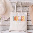 Toddler Teacher Retro Groovy Women Happy First Day Of School Canvas Tote Bag, Groovy Teacher Tote Bags, gift for family, gift for coworker Toddler Teacher Retro Groovy Women Happy First Day Of School Canvas Tote Bag, Groovy Teacher Tote Bags, gift for family, gift for coworker