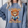 All The Cool Lions Are Reading Lion Teacher Men Women Kids Comfort Colors Sweatshirt Blue Jean