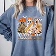 Trick Or Teach Groovy Teacher Halloween Floral Ghost Comfort Colors Sweatshirt Blue Jean