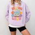 Helping Little Minds Grow Teacher First Day Back To School Comfort Colors Sweatshirt Orchid