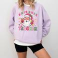 Santa's Favorite Teacher Groovy Christmas Teacher Boys Girls Comfort Colors Sweatshirt Orchid Santa's Favorite Teacher Groovy Christmas Teacher Boys Girls Comfort Colors Sweatshirt Orchid