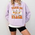 Teacher Halloween Trick Or Teach Retro Groovy Floral Ghost Comfort Colors Sweatshirt Orchid Teacher Halloween Trick Or Teach Retro Groovy Floral Ghost Comfort Colors Sweatshirt Orchid