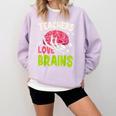 Teachers Love Brains Skeleton Halloween Teacher Funny Comfort Colors Sweatshirt Orchid Teachers Love Brains Skeleton Halloween Teacher Funny Comfort Colors Sweatshirt Orchid