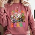 Inclusion Isnt Scary Halloween Skeleton Ghost Sped Teacher Comfort Colors Sweatshirt Crimson