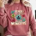 I Teach The Cutest Little Monsters Teacher Halloween Outfit Comfort Colors Sweatshirt Crimson