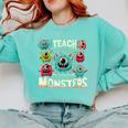 I Teach The Cutest Little Monsters Teacher Halloween Outfit Comfort Colors Sweatshirt Chalky Mint