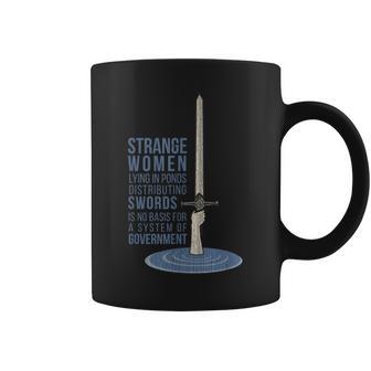 Vintage Strange Lying In Ponds Distributing Swords Coffee Mug - Thegiftio UK