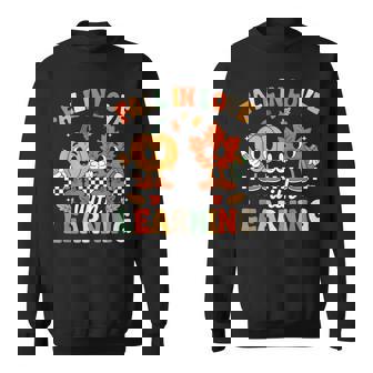 Fall In Love With Learning Autumn Thanksgiving Teacher Sweatshirt | Mazezy