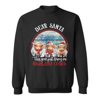 Highland Cow Cattle Xmas Santa Claus Christmas Highlander Sweatshirt - Thegiftio UK