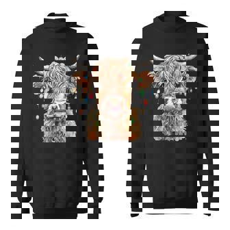 Highland Cow Xmas Lights Merry Christmas Pajamas Holiday Sweatshirt - Monsterry