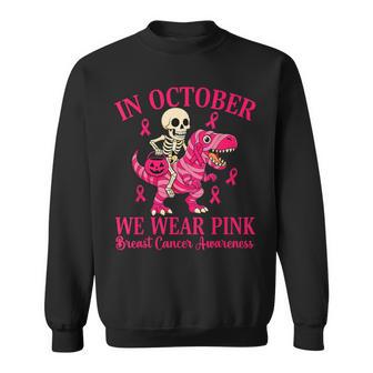 Skeleton Riding Dinosaur Trex Halloween Breast Cancer Sweatshirt - Thegiftio UK