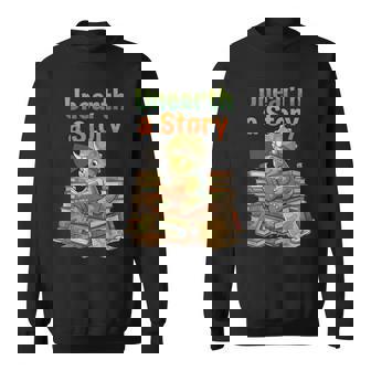 Unearth A Story Triceratops Dinosaur Reading Books Cute Dino Sweatshirt | Mazezy