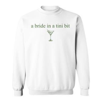 A Bride In A Tiny Bit Bride Cocktail Martini Bachelorette Sweatshirt - Monsterry