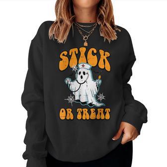 Halloween Ghost Nurse Stick Or Treat Costume Scrub Top Women Women Sweatshirt - Thegiftio