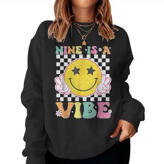 Nine Is A Vibe 9Th Birthday Groovy Smile Face 9 Years Old Women Sweatshirt - Monsterry