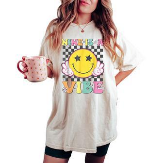 Nine Is A Vibe 9Th Birthday Groovy Smile Face 9 Years Old Women's Oversized Comfort T-shirt - Thegiftio UK