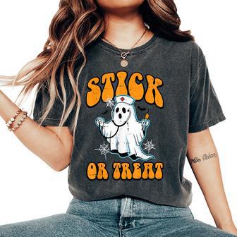 Halloween Ghost Nurse Stick Or Treat Costume Scrub Top Women Women's Oversized Comfort T-Shirt - Thegiftio UK
