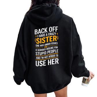Back Off I Have A Crazy Sister She Has Anger Issues Graphic Women Oversized Hoodie Back Print - Thegiftio UK