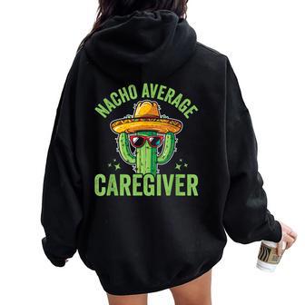 Nacho Average Caregiver Caregiving Nursing Caretaker Nurse Small Black Women Oversized Hoodie Back Print - Thegiftio UK