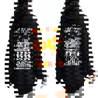 Retro Fall In Love With Learning Autumn Leaf Pumpkin Teacher Women Oversized Hoodie Back Print | Seseable UK