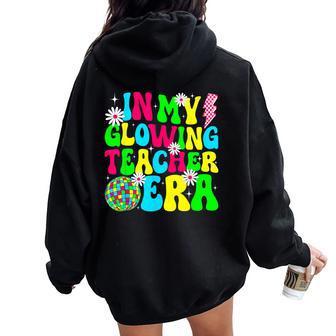 Retro Groovy In My Glowing Teacher Era Happy Teacher's Day Women Oversized Hoodie Back Print - Thegiftio UK