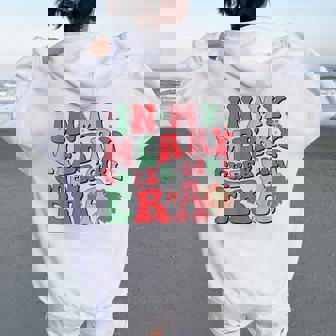 In My Merry Cheer Girl Era Groovy Christmas Cheerleading Women Oversized Hoodie Back Print - Thegiftio