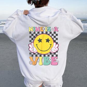 Nine Is A Vibe 9Th Birthday Groovy Smile Face 9 Years Old Women Oversized Hoodie Back Print - Thegiftio UK