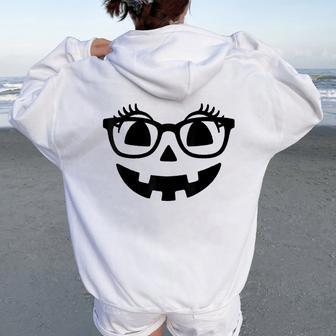 Pumpkin With Eyelashes Halloween Fall Jack-O-Lantern Face Women Oversized Hoodie Back Print - Thegiftio