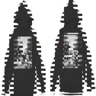 Comical Dachshund Encounters Mythical Creatures Bigfoot And Dachshund On Road Black Small Short Sleeve Hoodie | Mazezy