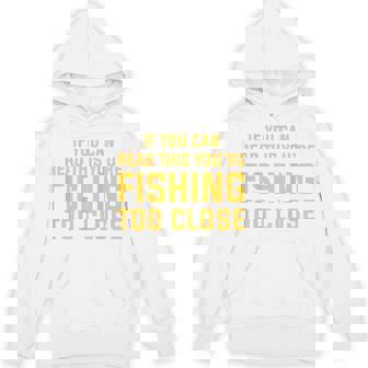 背面には「If You Can Read This You're Fishing Too Close パーカー - Kawaiitshirt