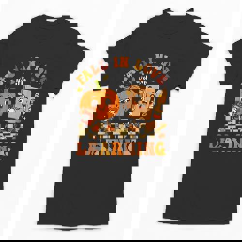 Fall In Love With Reading Book Autumn Pumpkins And Teachers Unisex T-Shirt - teacherstshirts.com