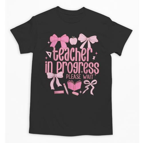 Women Teacher In Progress Coquette Pink Bow Future Teacher Unisex T-Shirt - teacherstshirts.com