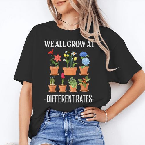 We All Grow At Different Rates Back To School Teacher Women's T-Shirt - teacherstshirts.com