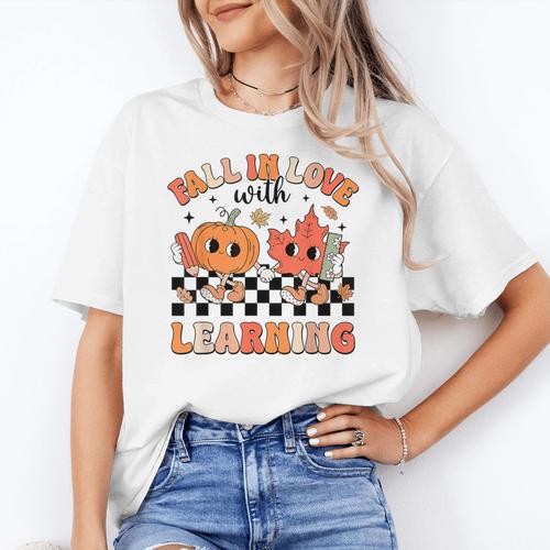 Retro Fall In Love With Learning Autumn Pumpkin Teacher Women's T-Shirt - teacherstshirts.com