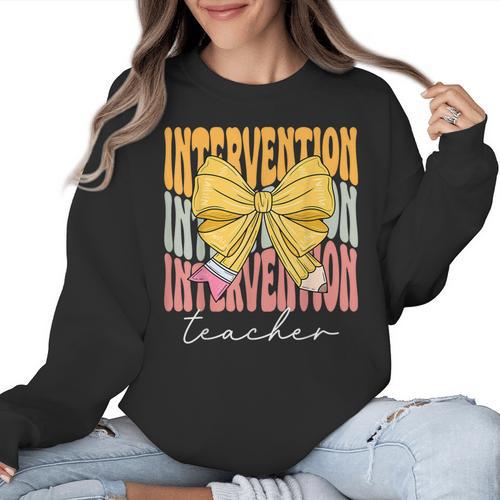 Interventionist Teacher Groovy Coquette Bow Back To School Women Crewneck Sweatshirt - teacherstshirts.com