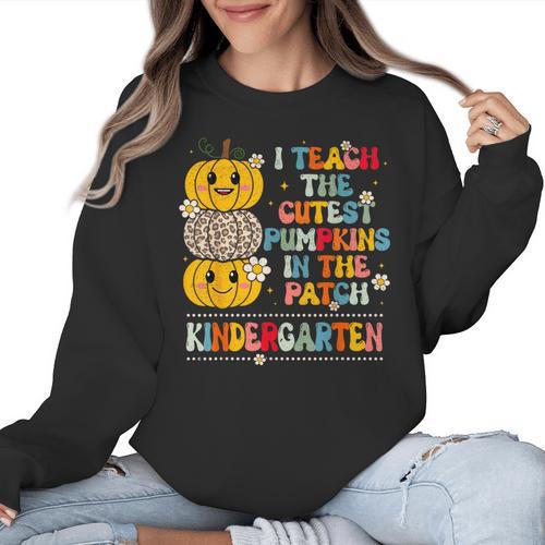 I Teach The Cutest Pumpkins Kindergarten Teacher Halloween Women Crewneck Sweatshirt - teacherstshirts.com