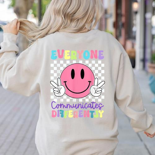 Everyone Communicates Differently Autism Awareness Teacher Women's Sweatshirt Back Print - teacherstshirts.com CA