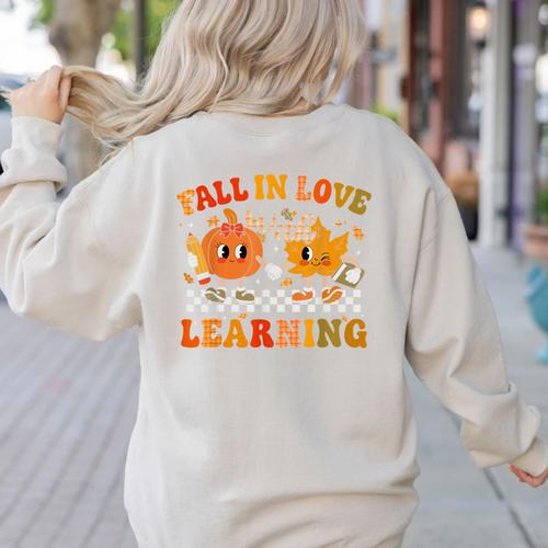 Fall In Love With Learning Autumn Pumpkin Fall Teacher Kids Women's Sweatshirt Back Print - teacherstshirts.com AU
