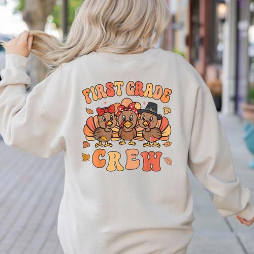 First Grade Crew Thanksgiving Fall Teacher 1st Grade Team Women's Sweatshirt Back Print - teacherstshirts.com AU