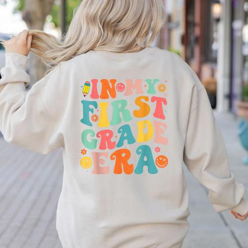 In My First Grade Era 1st Grade Teacher Back To School Women's Sweatshirt Back Print - teacherstshirts.com CA