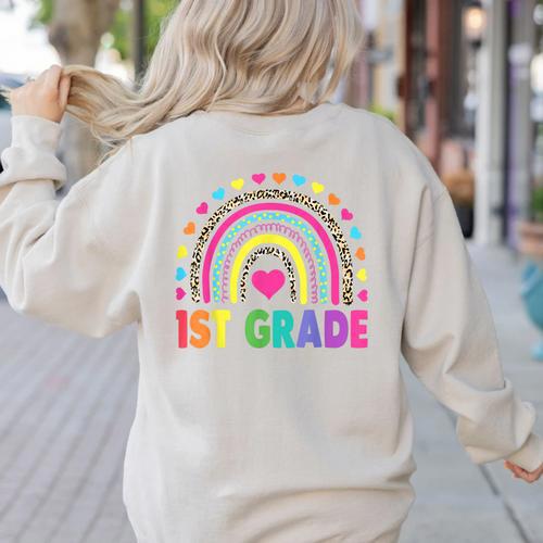First Grade Rainbow Girls Boys Teacher Team 1st Grade Squad Women's Sweatshirt Back Print - teacherstshirts.com AU