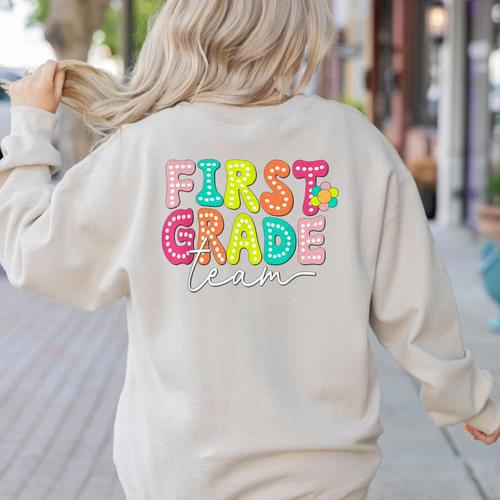 First Grade Team Teacher Back To School 1st Grade Squad Kids Women's Sweatshirt Back Print - teacherstshirts.com CA